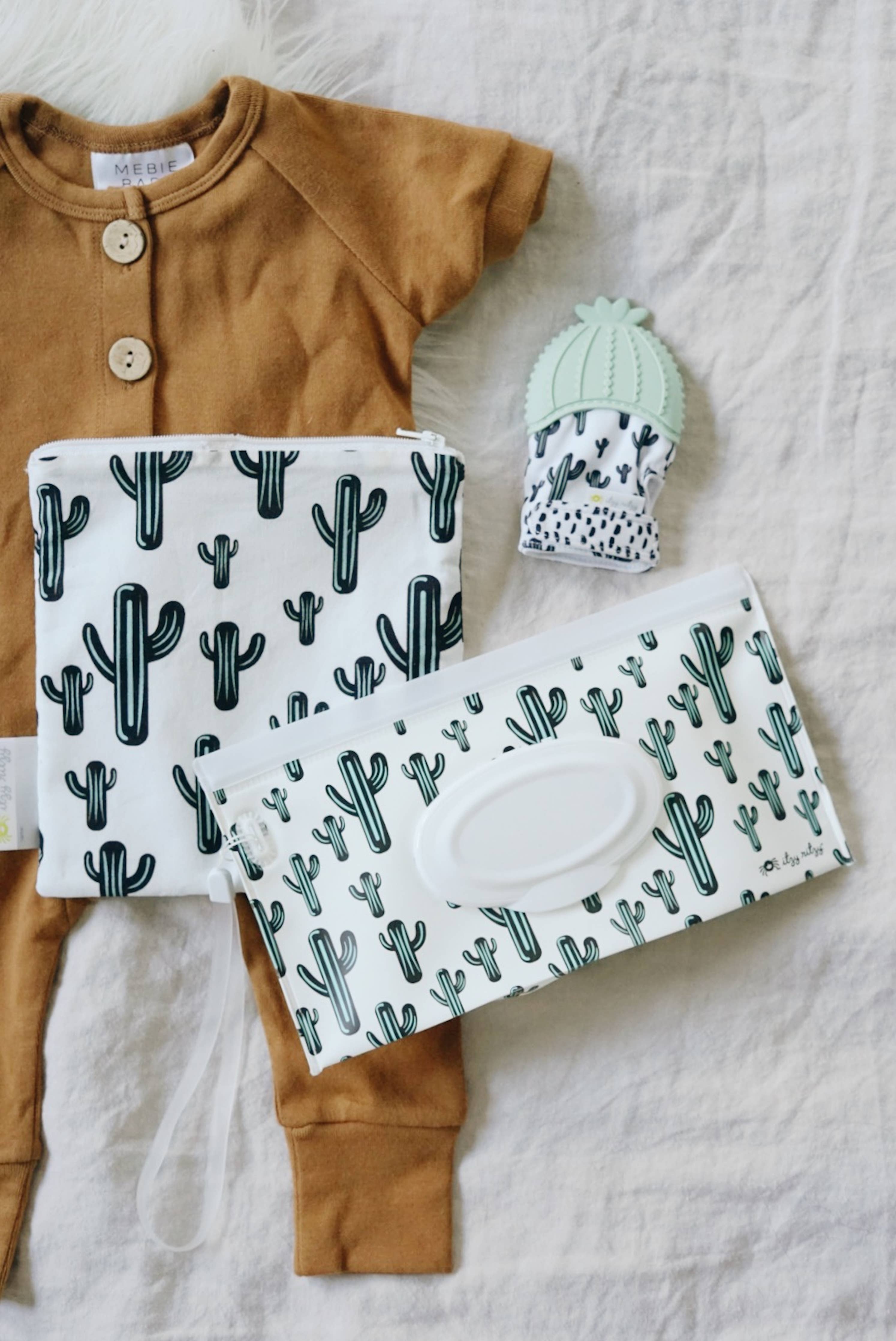 Itzy Mitt™ Silicone Teething Mitts: Dinosaur - Premium teethers from Itzy Ritzy - Just $9.95! Shop now at Pat's Monograms